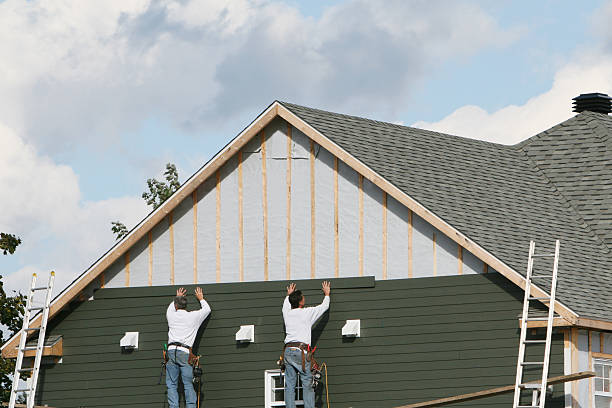 Professional Siding technician working in Drake, CO